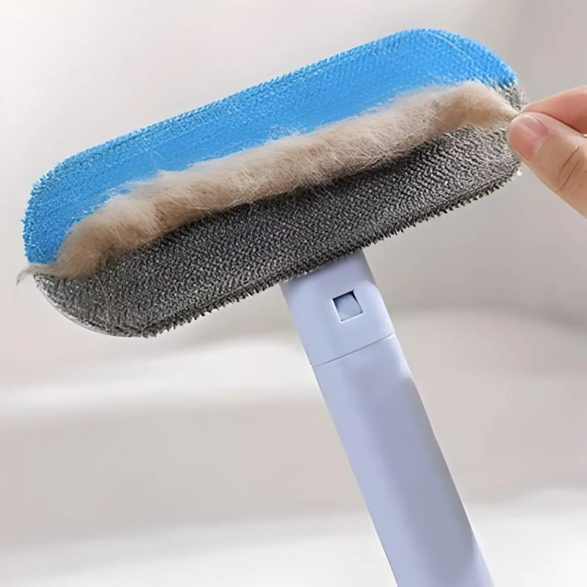 brosse anti poil chat efficace avec design pratique pour retirer les poils d'animaux