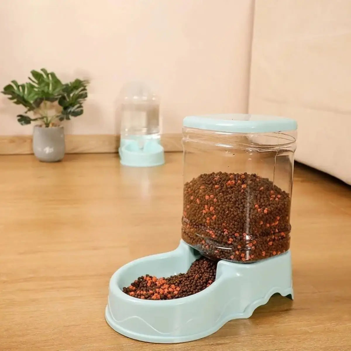 distributeur de croquettes pour chat CasaDuo rose pratique et élégant pour nourrir votre animal.