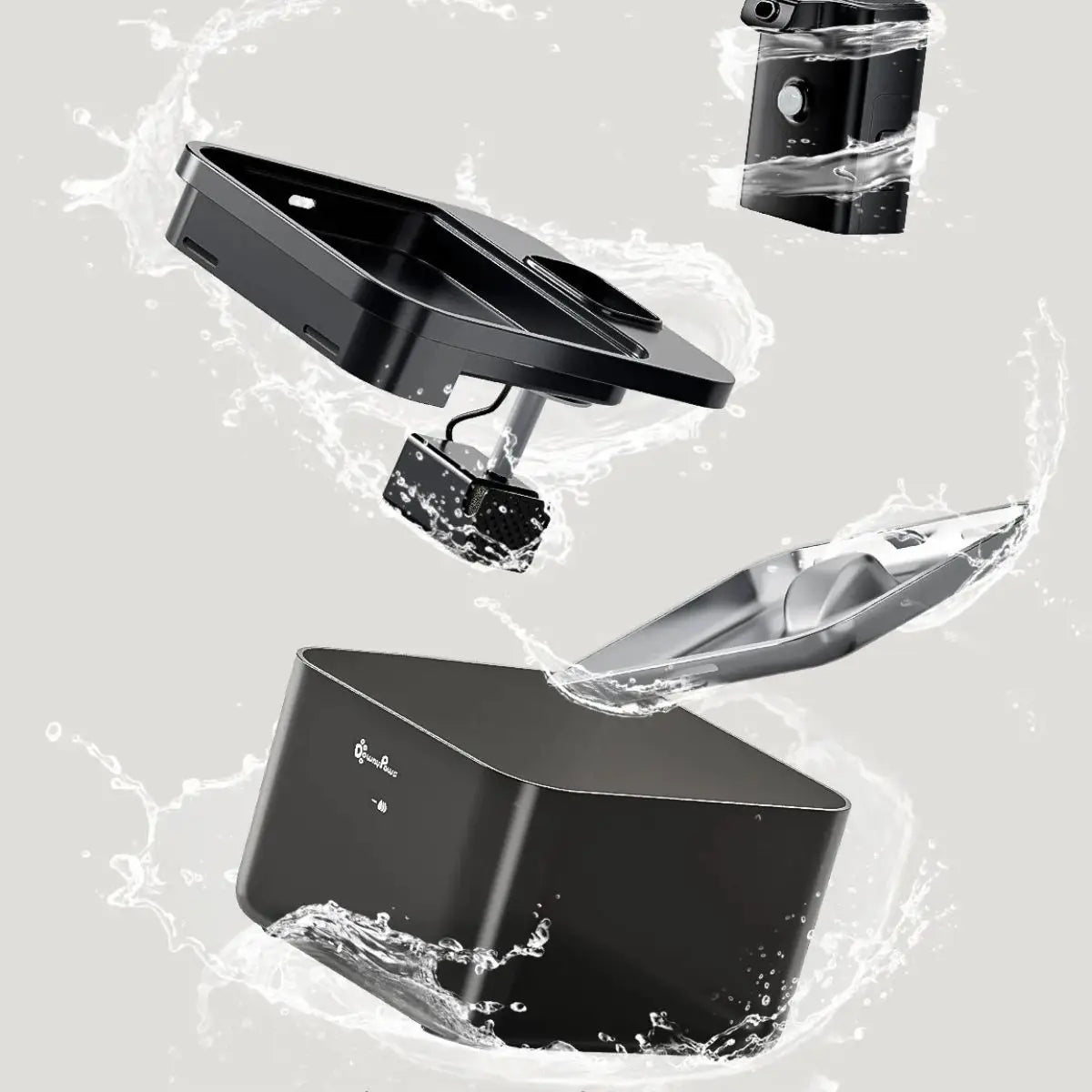 fontaine a eau chat DownyPaws noire vue de dessus avec badge BPA free, chat touchant le bord du plateau.