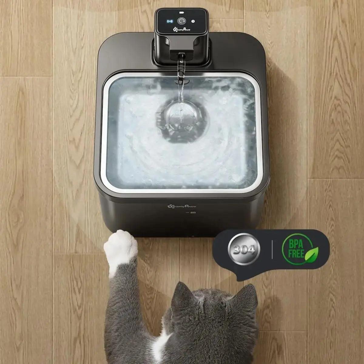 fontaine a eau chat DownyPaws noire en vue éclatée, modules démontables sous éclaboussures d’eau pour entretien facile.