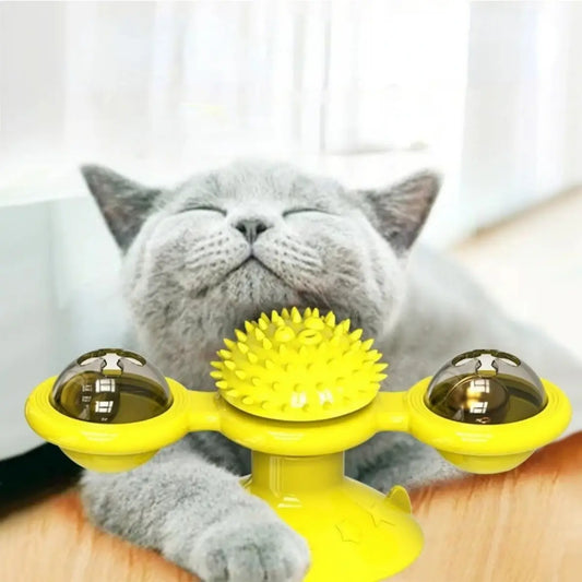 Jouet chat interactif jaune avec balles et picots pour divertissement et relaxation.
