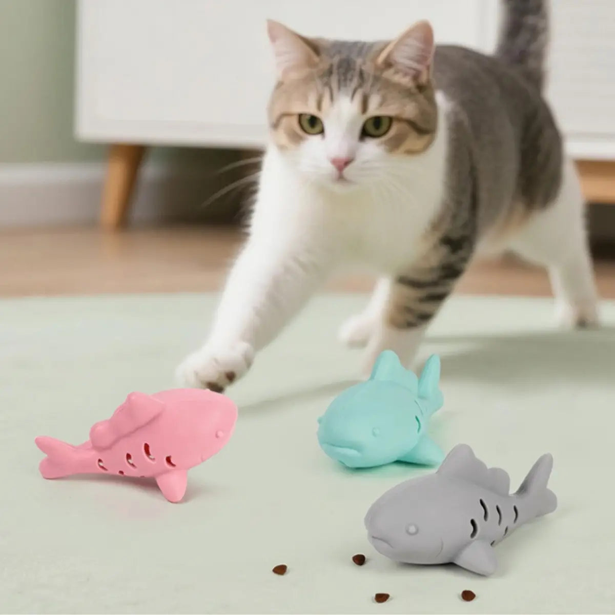 jouet pour chat en forme de poisson coloré, idéal pour divertir votre animal.