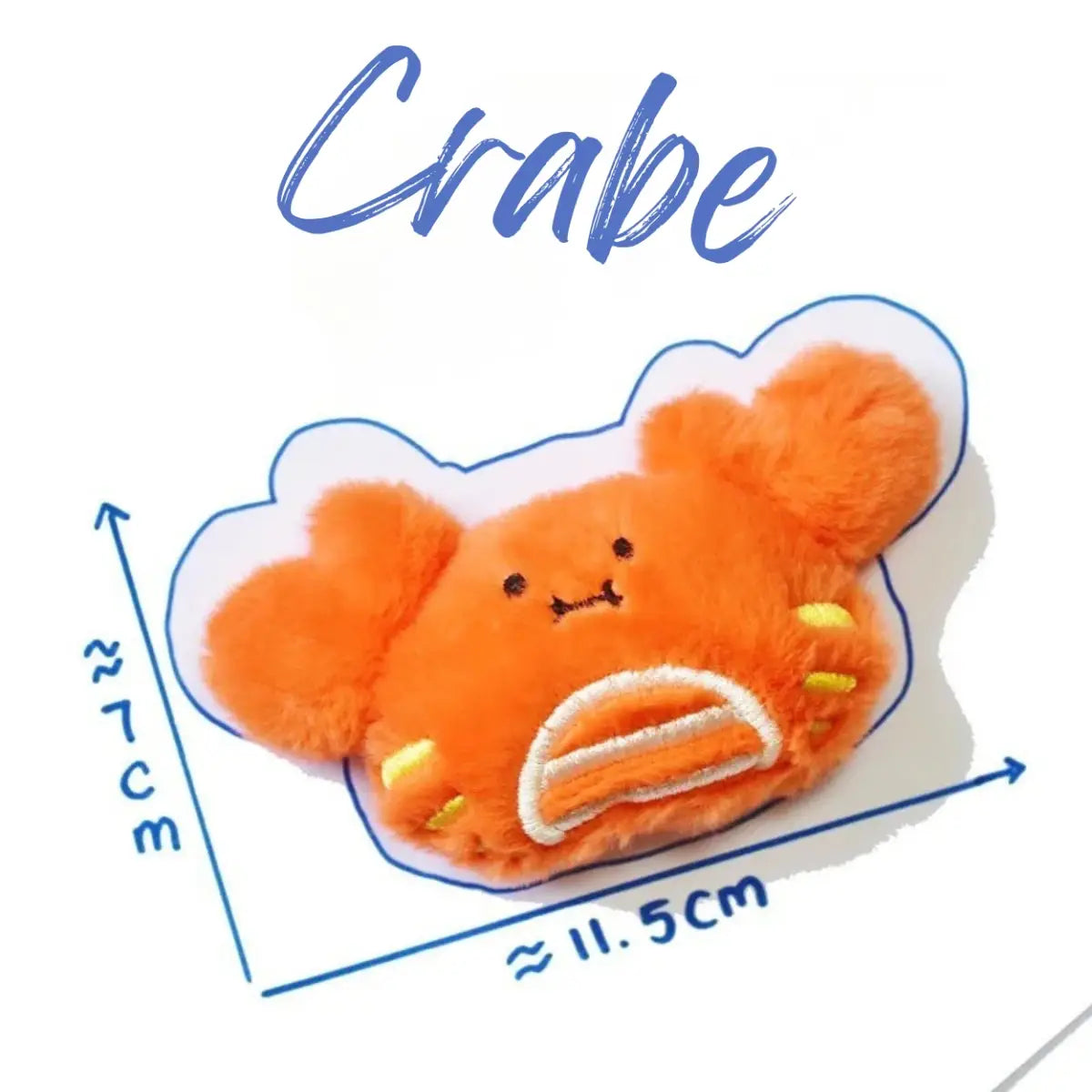 Jouet pour chat en forme de crabe doux et moelleux, mesurant environ 11.5 cm par 7 cm.