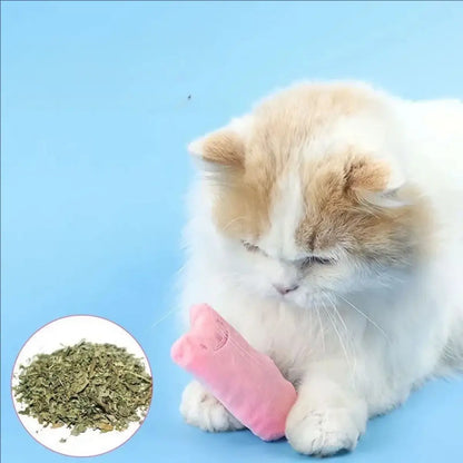 jouet pour chat Croquez‑Moi en tissu rose avec herbe à chat, parfait pour divertir votre félin.