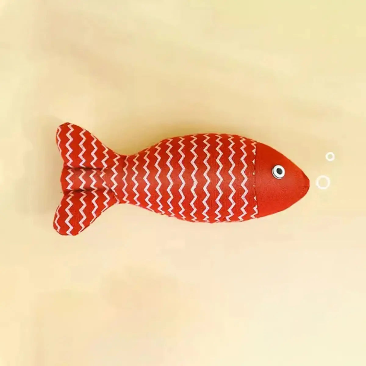 jouet pour chat en forme de poisson rouge avec motifs zigzag sur fond jaune