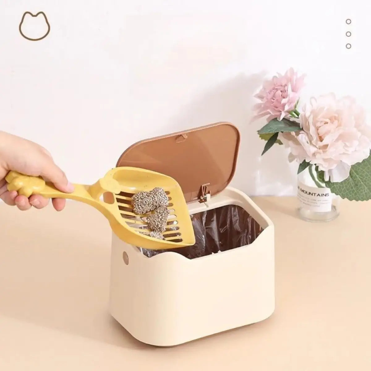 litière avec pelle et boîte design pour un nettoyage pratique