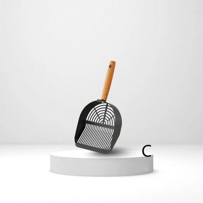 pelle a litiere pour chat en acier avec manche en bois, design moderne et élégant - fond neutre