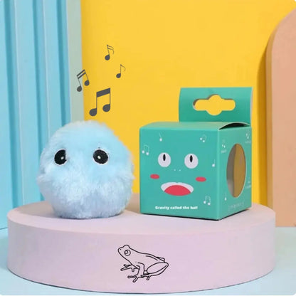 Jouet en peluche bleue avec boîte verte et notes musicales en arrière-plan.