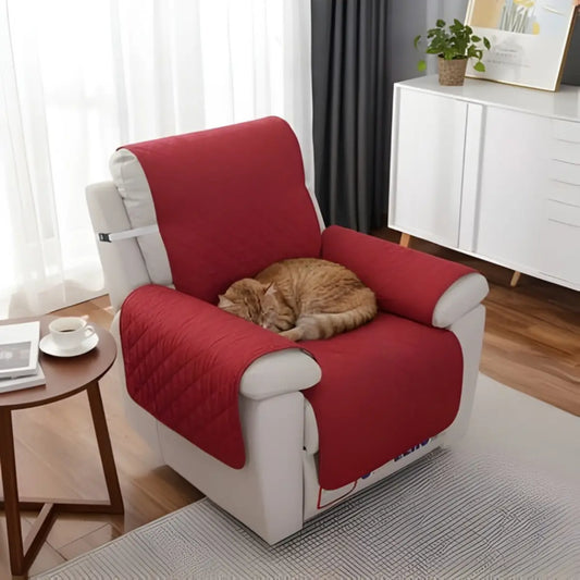 protection canapé chat rouge avec un chat reposant sur un fauteuil blanc - vue de dessus